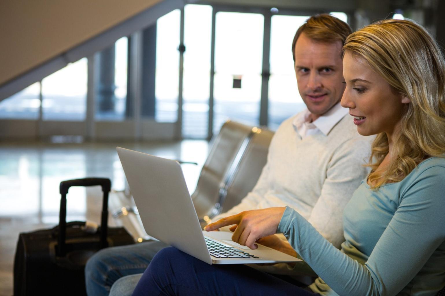 Small business owner reviewing financial documents and planning cash flow