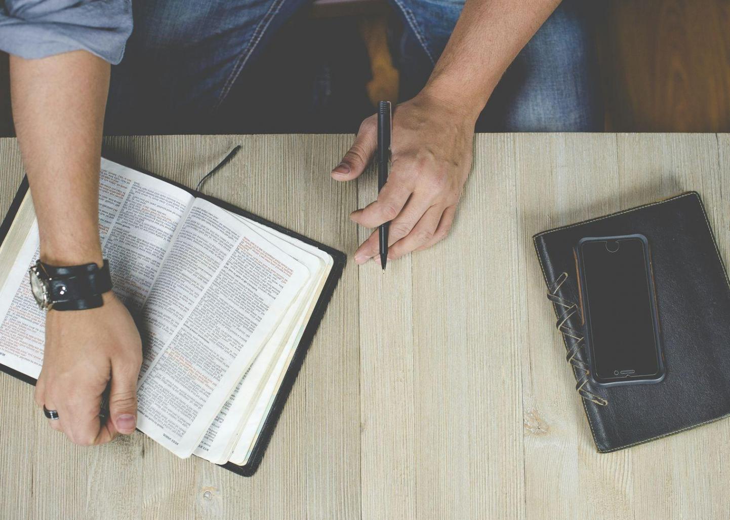 Entrepreneur analyzing business metrics and financial performance on laptop